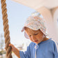 Acorn Dino Soft Jersey Flap Cap