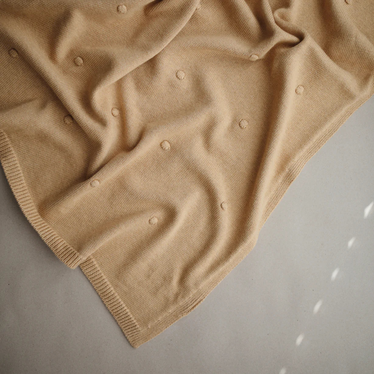 Mushie Knitted Baby Blanket Textured Dots Mustard Melange